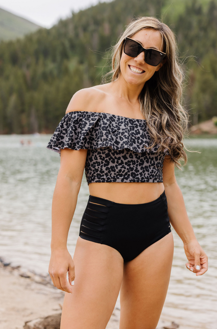 Olivia is wearing an M in both bottoms and tops.