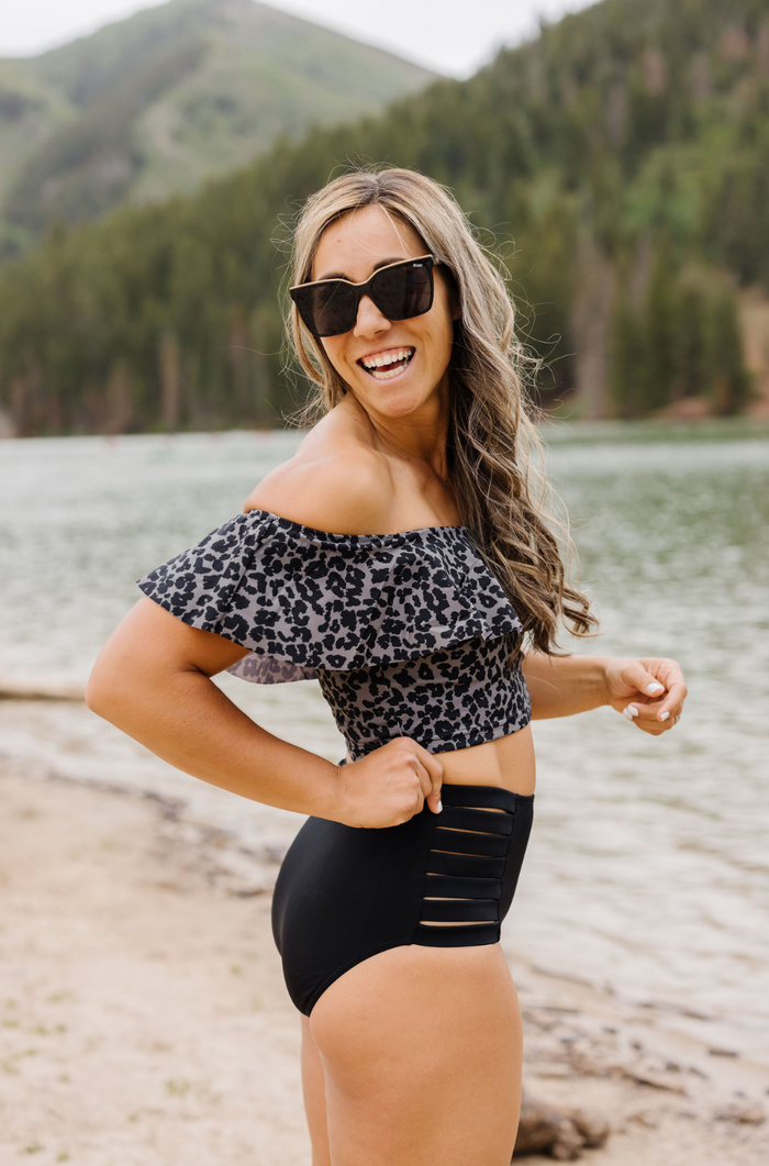 Olivia is wearing an M in both bottoms and tops.