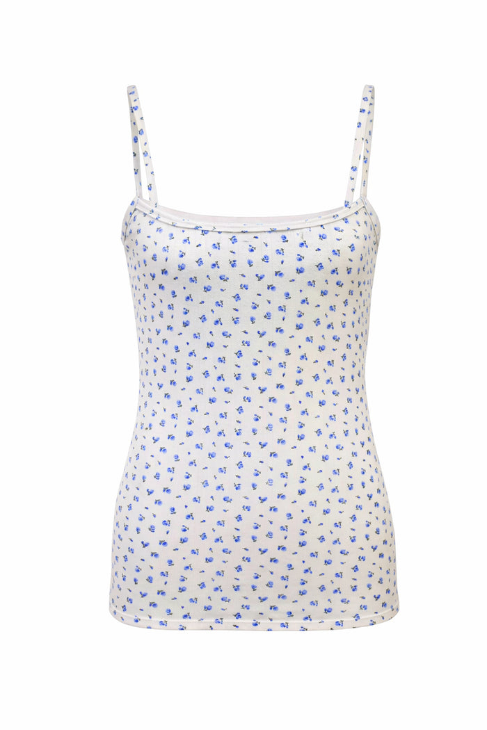 White camisole with blue floral pattern on a white background