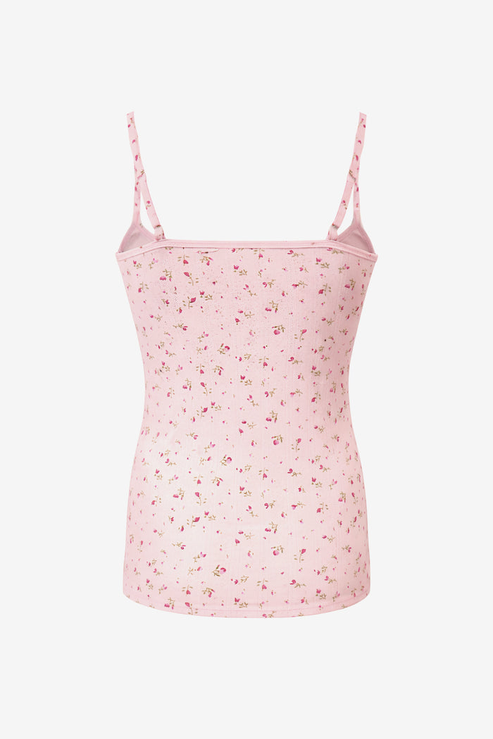 Pink floral camisole on a white background