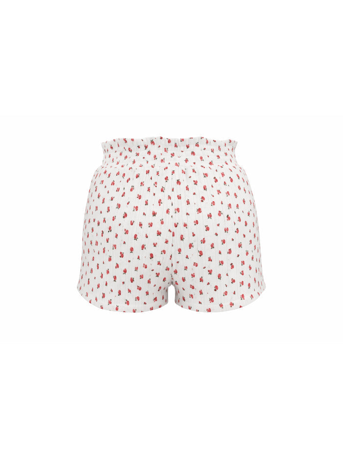 White shorts with red pattern on a white background