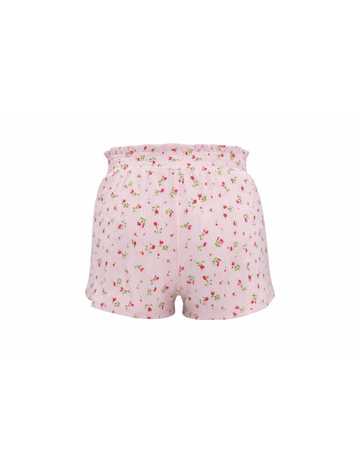 Floral patterned shorts on a white background