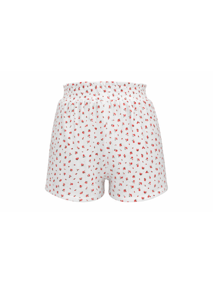 White shorts with red pattern on a white background