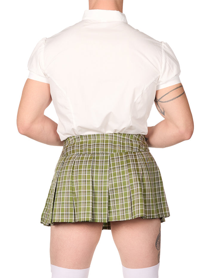 Person wearing a white shirt and green plaid skirt on a white background