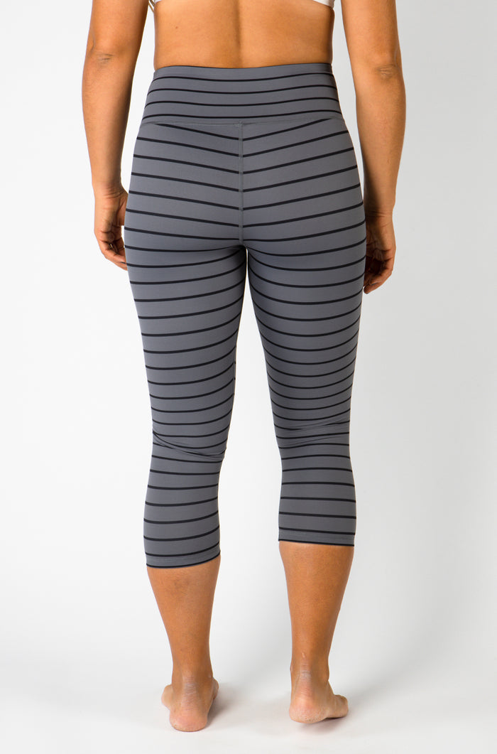 Olivia is a size 8 and wearing a Medium