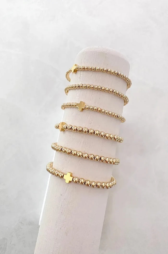 The Signature Gold Cross Collection