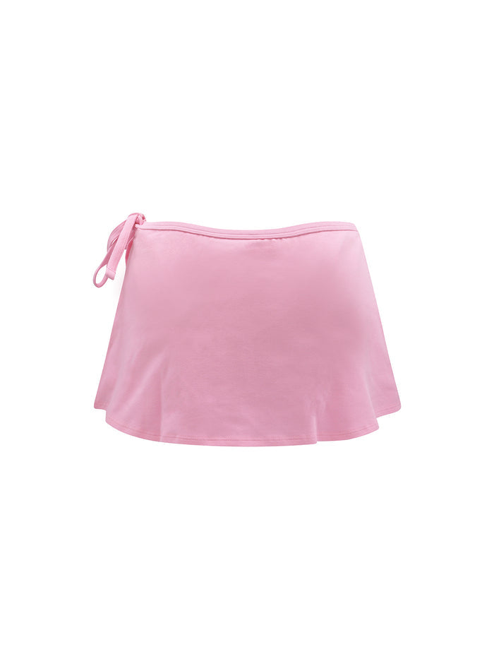 A light pink wrap-style skirt with side ties, shown flat against a solid white background.